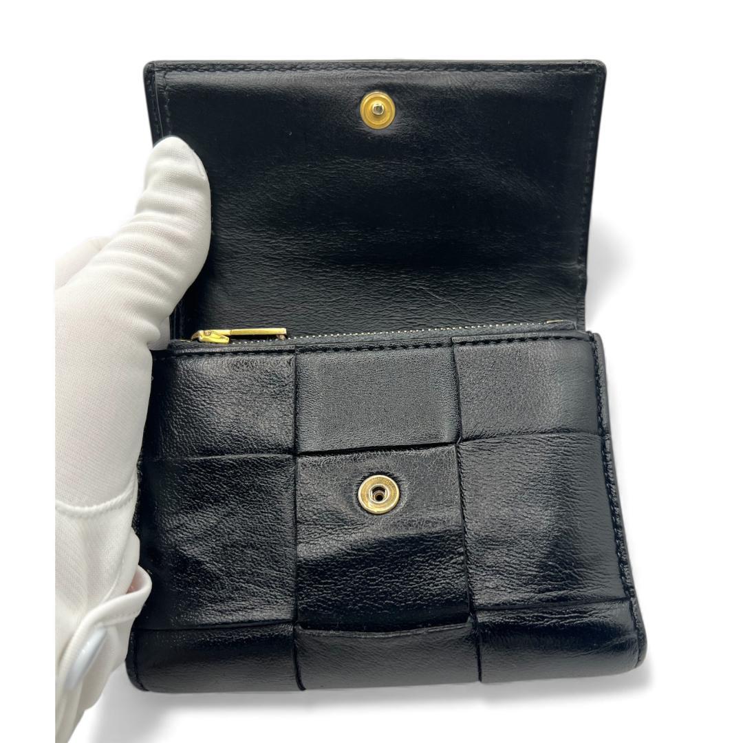 こんけー　BOTTEGA VENETA　黒　カセット レザー三つ折り財布