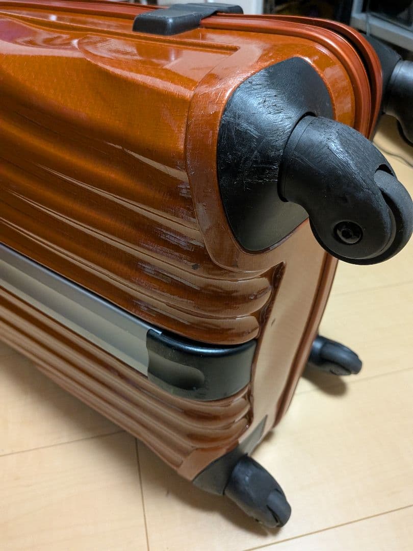 サムソナイト 波状テクスチャー キャリーケース コスモライト 4輪 オレンジ