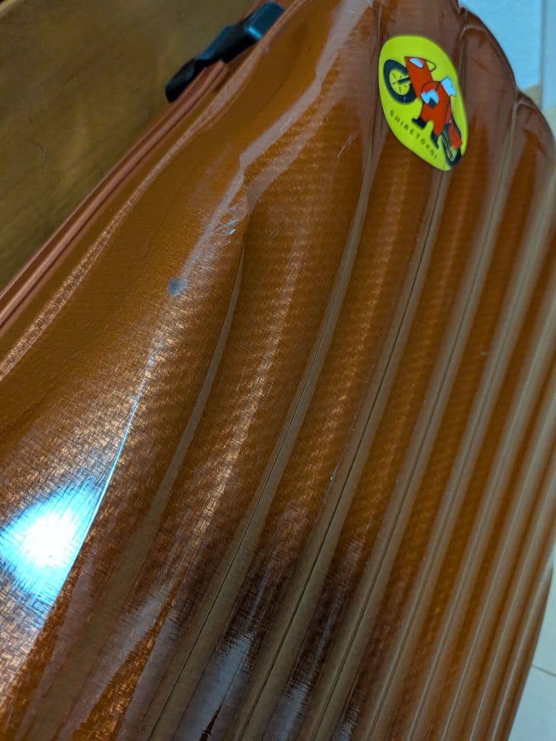 サムソナイト 波状テクスチャー キャリーケース コスモライト 4輪 オレンジ