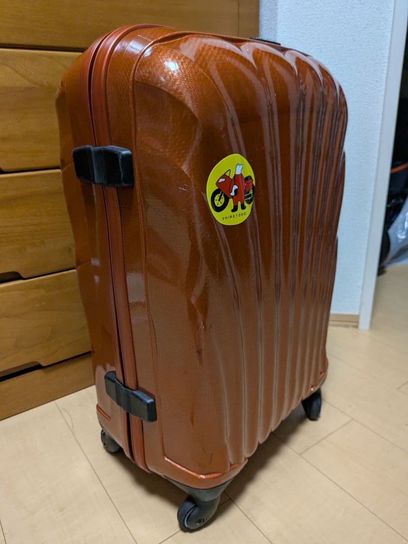 サムソナイト 波状テクスチャー キャリーケース コスモライト 4輪 オレンジ