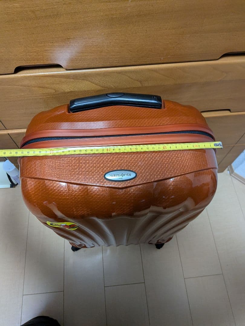 サムソナイト 波状テクスチャー キャリーケース コスモライト 4輪 オレンジ