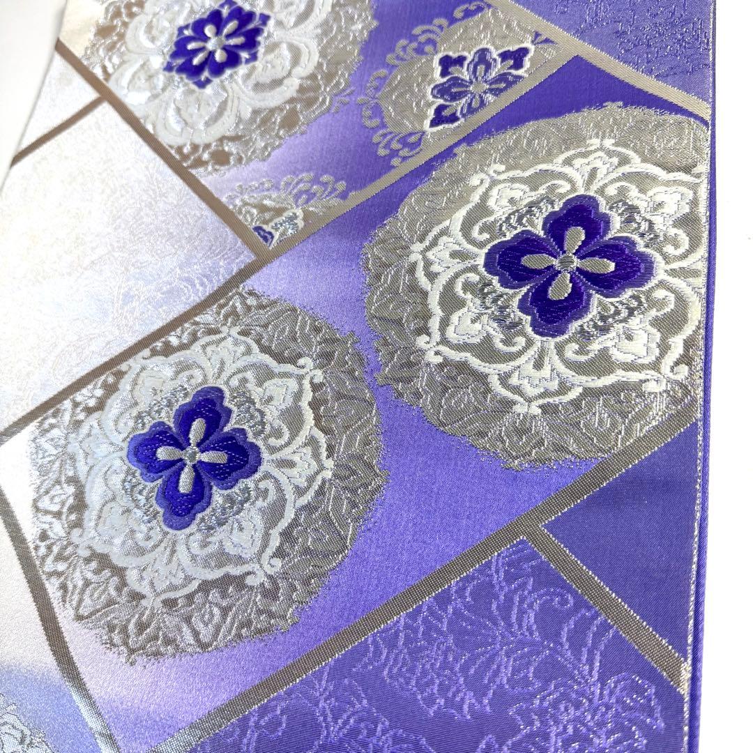 5k2491 袋帯　絹　唐織　正倉院文様　華文　紫　銀色　白　花柄　和装　着物