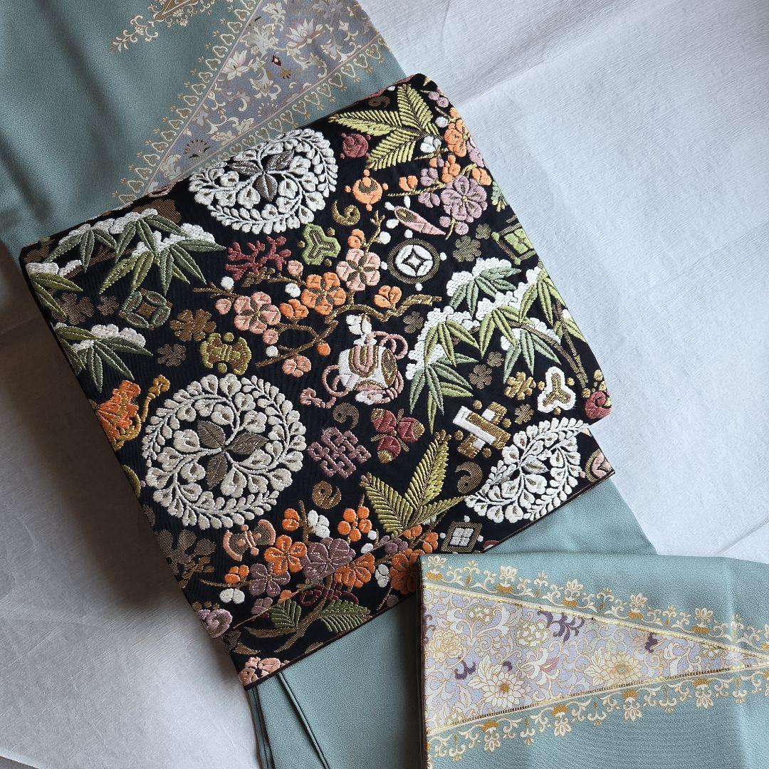 ハレの日に　宝尽くしと雪持ち松竹梅柄　唐織の袋帯