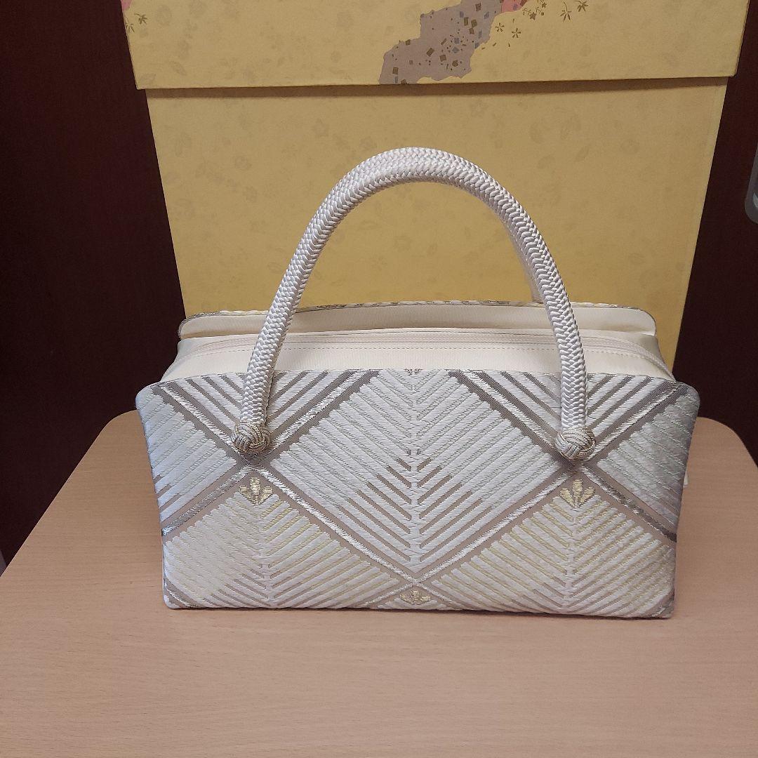 12月7日までのお値下げ　10,000円引　伊と忠　利休バッグ シルバー系 松菱