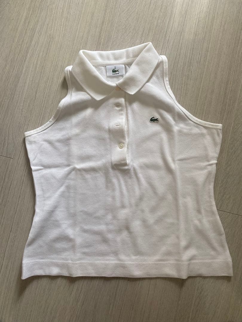 LACOSTE ホワイト ノースリーブポロシャツ