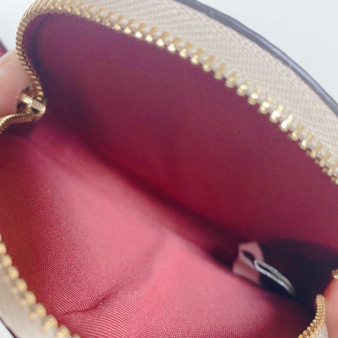 【新品未使用】COACHコーチ★丸型ラウンドケース★花柄フラワー★ベージュ