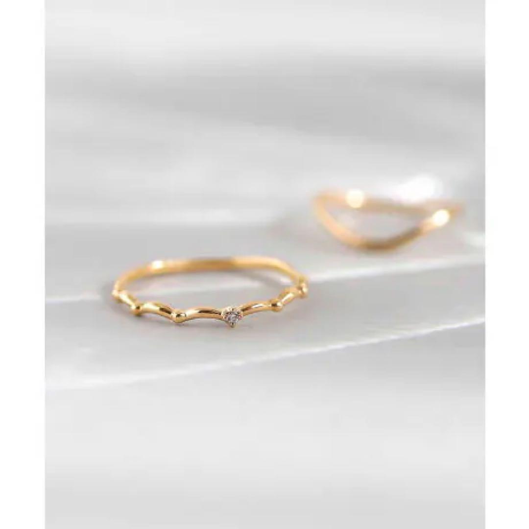 【ANEMONE】 K10 一粒ダイヤウェーブリング　11号