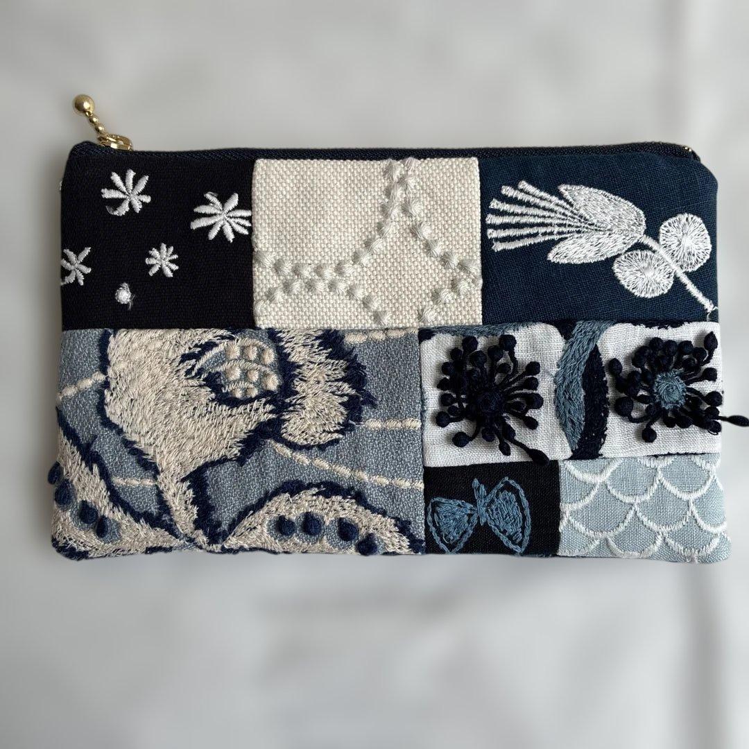 ミナペルホネン 生地使用　wind flower パッチワークフラットポーチ