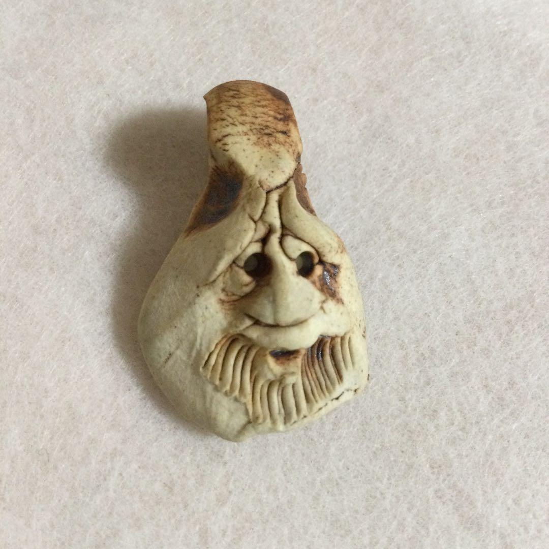 呪物　御守り　顔　ペンダントヘッド