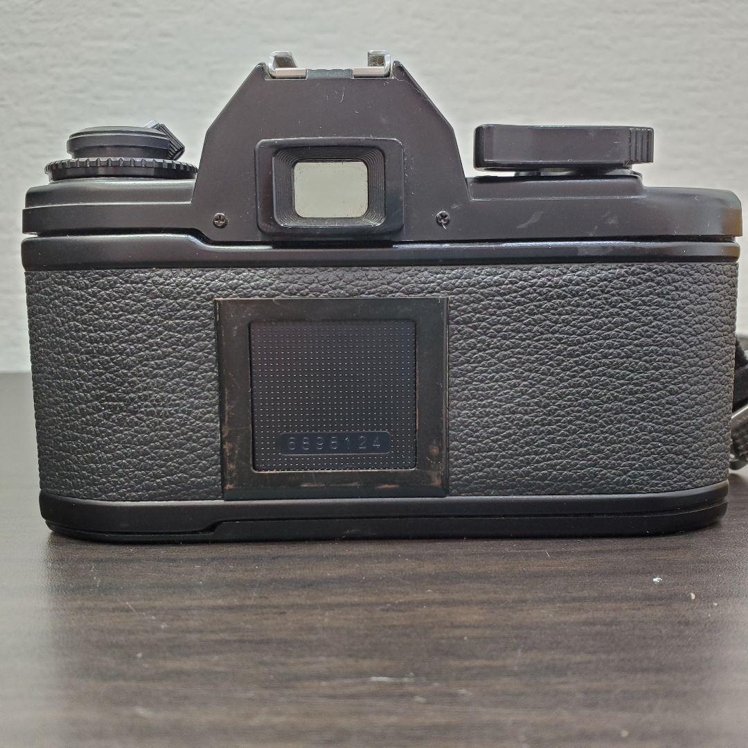 Nikon EM + NIKKOR 50mm F1.8 Ai ストラップ付