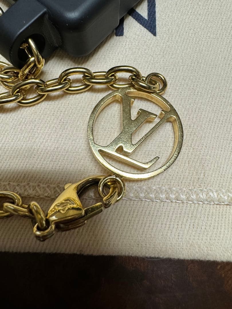 LOUIS VUITTON M81997 リ・トランク iPhone14Pro