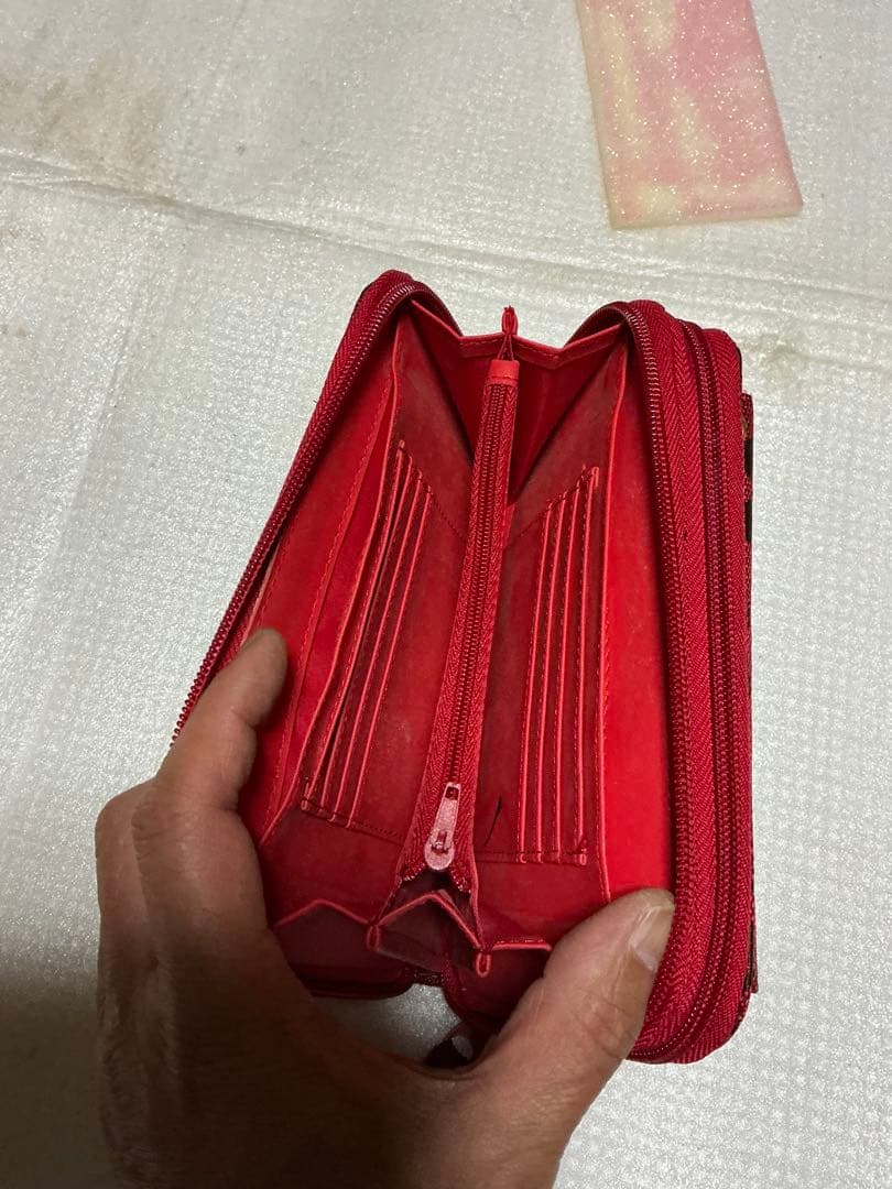 コーチ多用途財布／赤柄。【新品未使用品　長財布】。