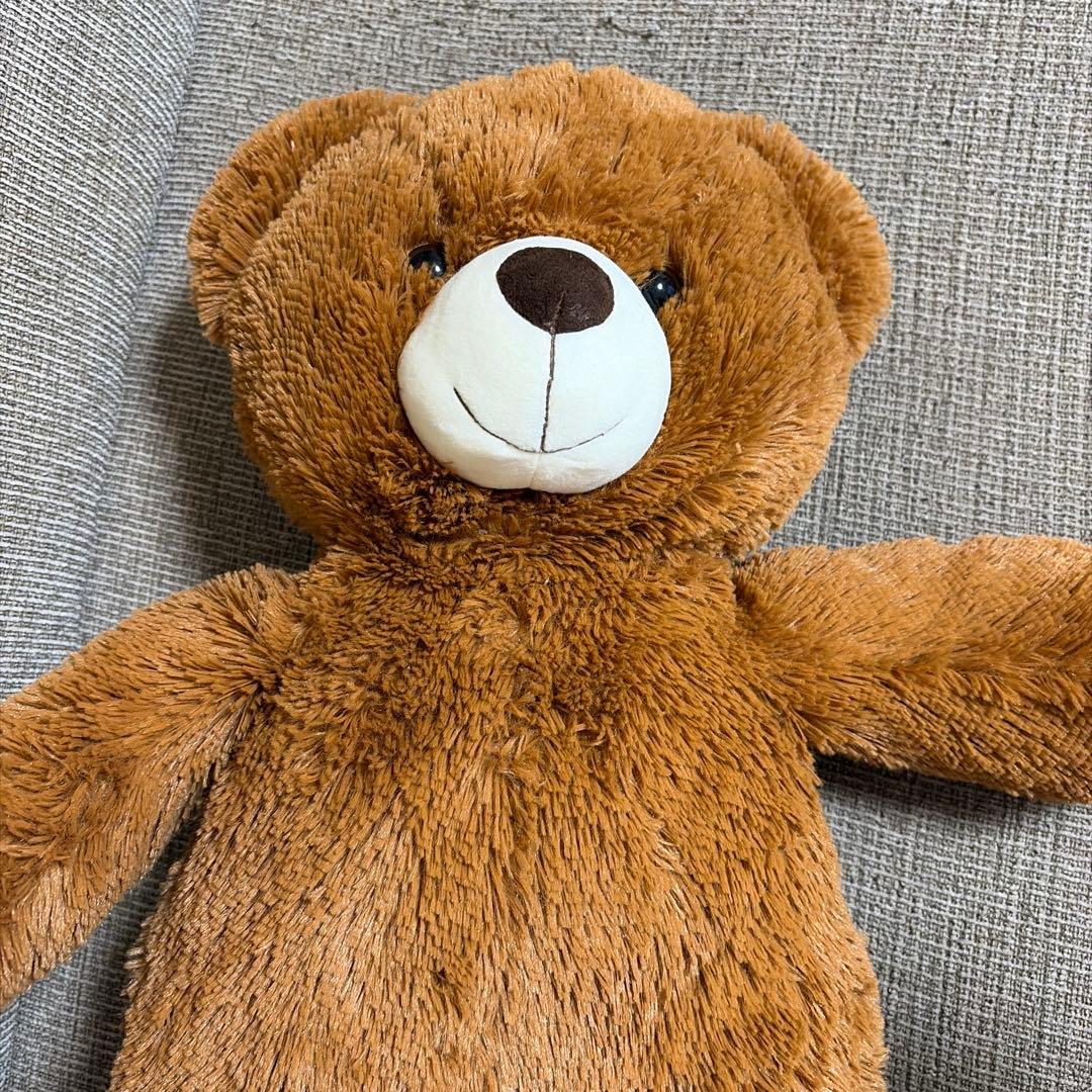 茶色のクマ型ぬいぐるみ