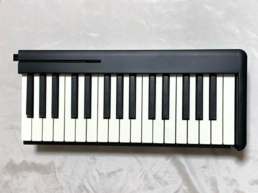 電子ピアノ 折り畳み タッチレスポンス61鍵盤 ポータブル キーボードピアノ