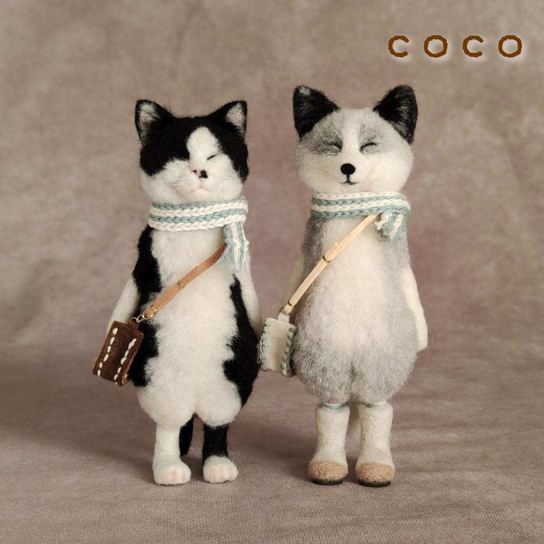 ショルダーバックを下げたプラチナフォックスさん