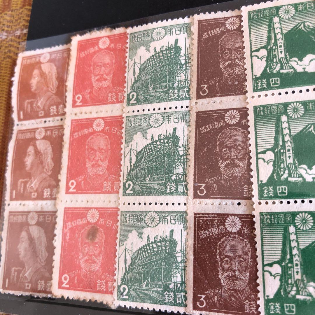 昭和14年～22年　大東亜戦争中・直後の切手２８種×３枚縦　計８４枚鑑賞シート入