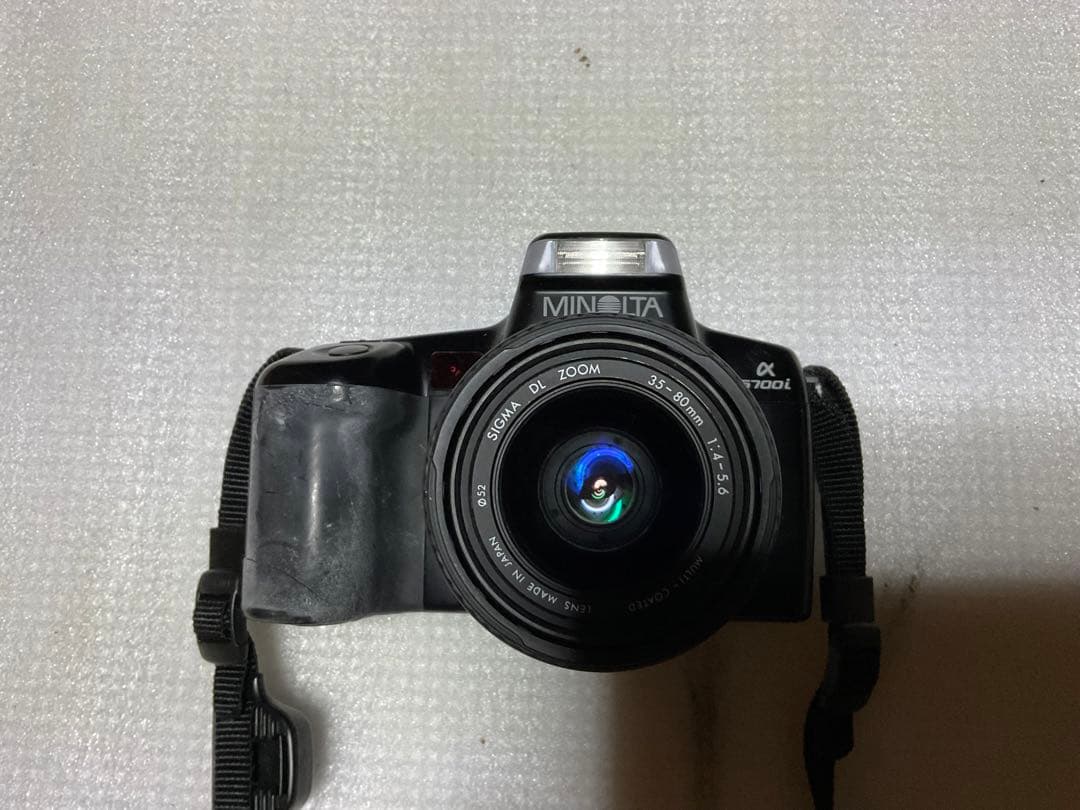 MINOLTA／アルファー・5700i。【シグマレンズ付き。持ち手僅かにキズ】。