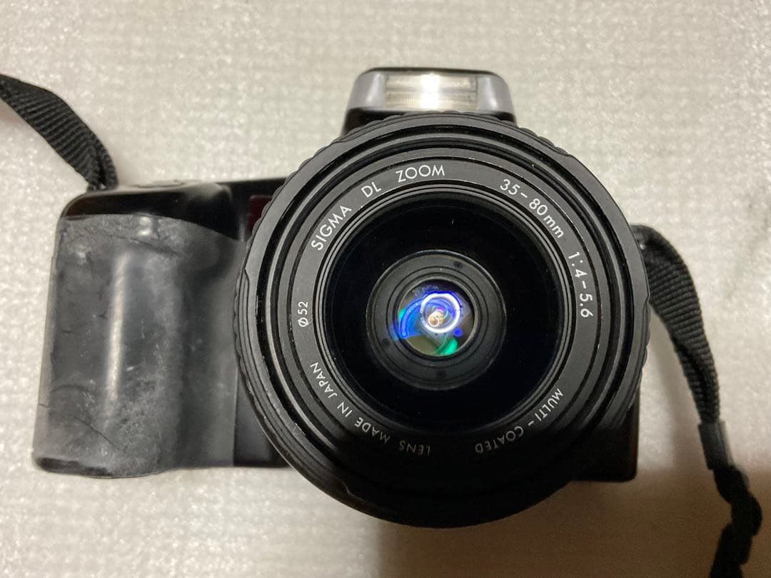 MINOLTA／アルファー・5700i。【シグマレンズ付き。持ち手僅かにキズ】。