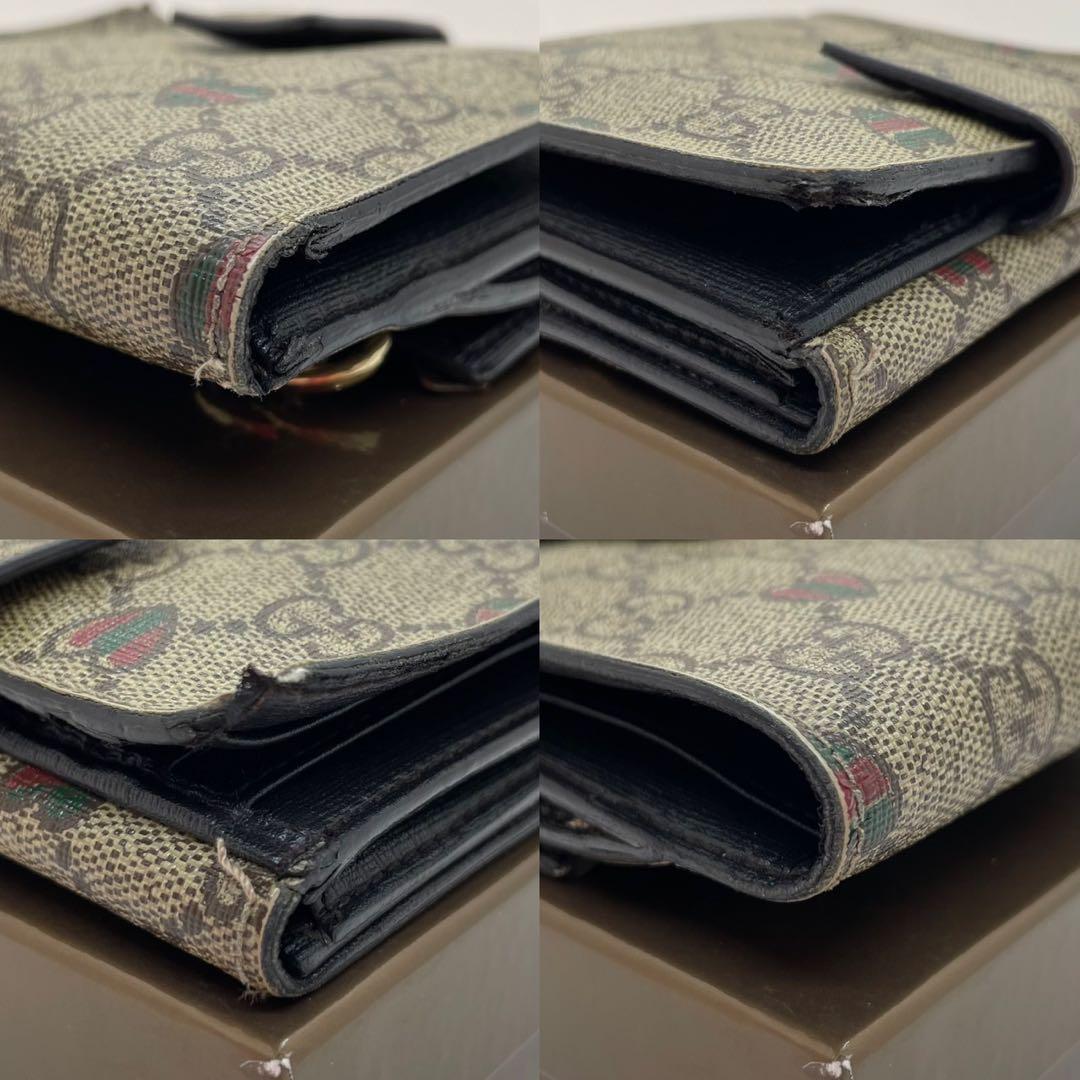【美品/付属品完備】グッチ 二つ折り財布 小銭 GGシマ リボン ロゴチャーム