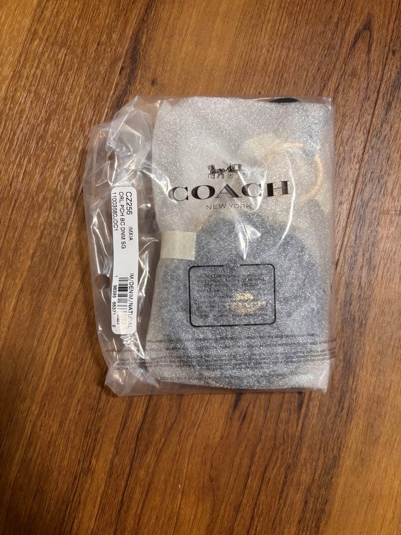 COACH コーチ　サーキュラーポーチバッグチャーム・シグネチャーデニム