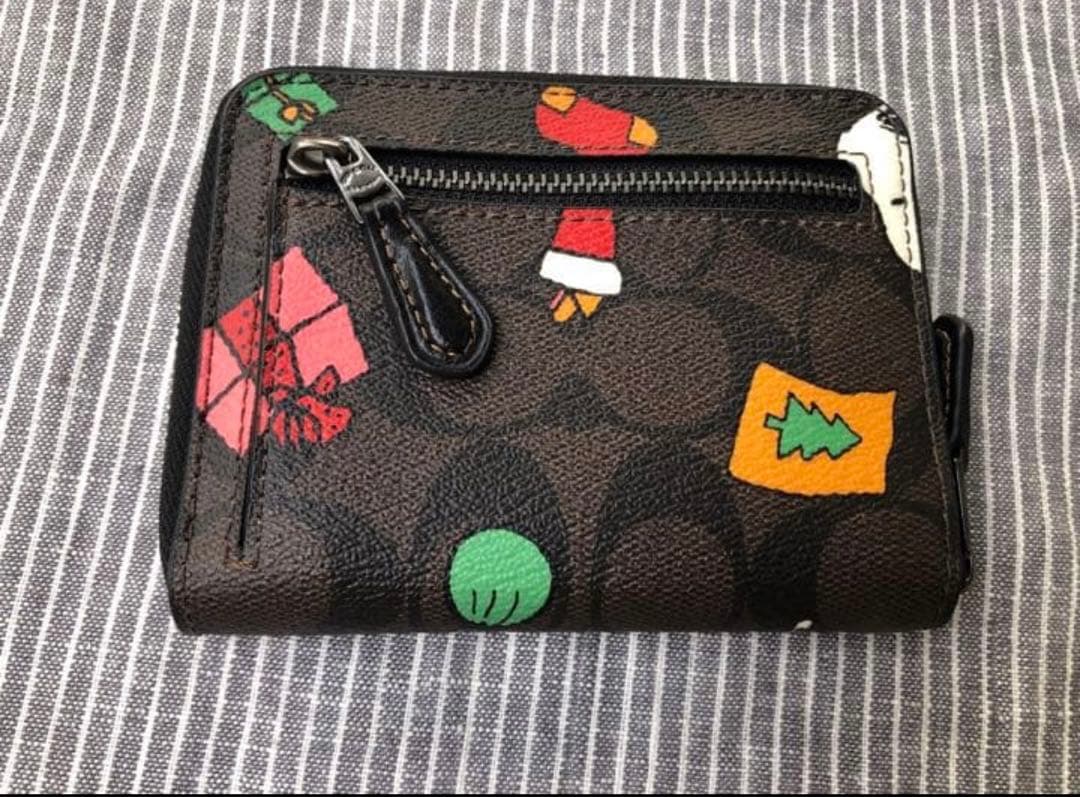 新品　コーチ　ピーナッツ　スヌーピー　折財布
