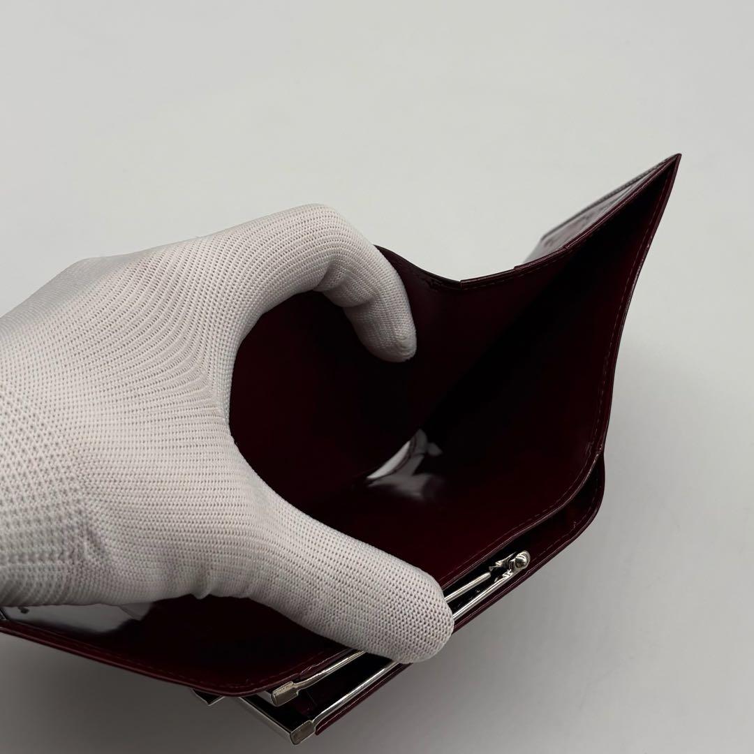 【美品】Cartier レザー 2つ折り財布 パンテール がま口 プレート ロゴ
