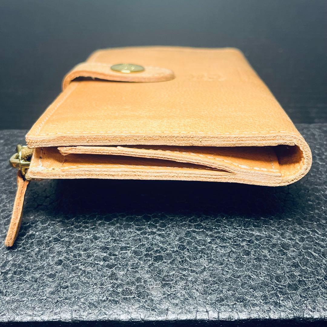 ILBiSONTEコンチョストラップ 二つ折り財布 ヌメナチュラルレザー本革