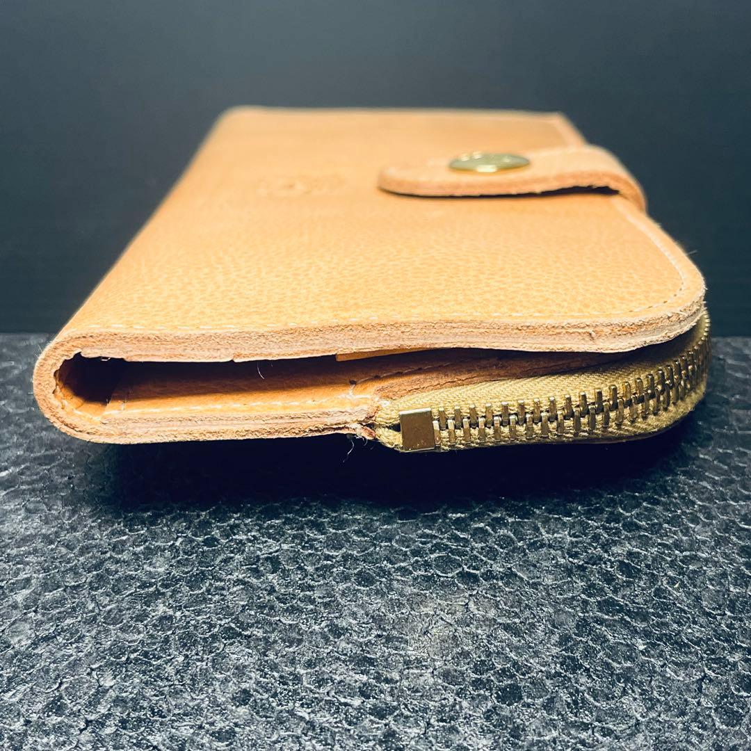 ILBiSONTEコンチョストラップ 二つ折り財布 ヌメナチュラルレザー本革