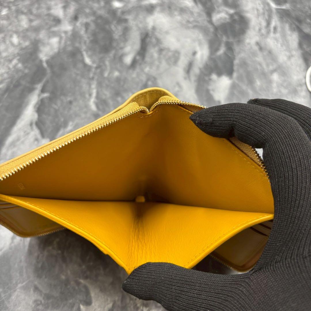 あらいぐま✨LOEWE ノット コンパクトウォレット イエローベージュ 財