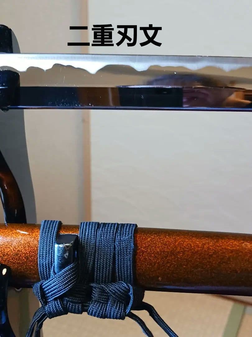 居合前差し用脇差、黒合皮革巻　黒鮫仕、刃紋.乱れ二重刃文　　　金具.勝龍一作