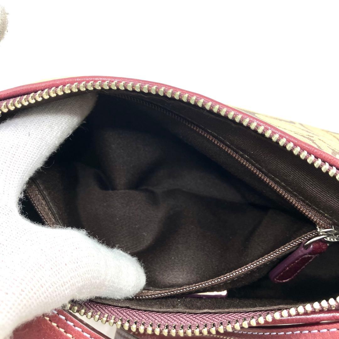 【美品】COACH コーチ ハンドバッグ アクセサリーポーチ シグネチャー　紫