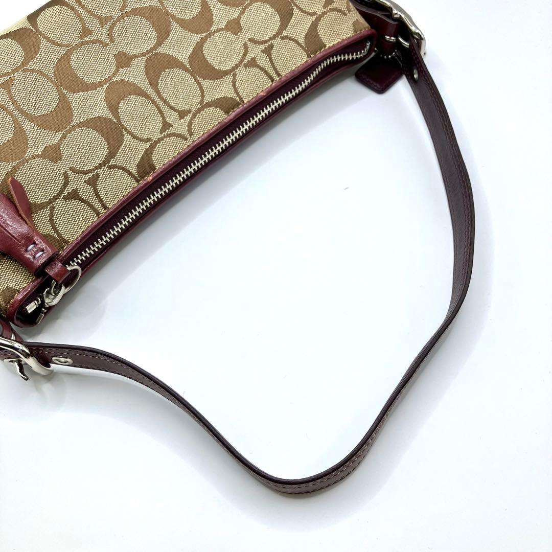 【美品】COACH コーチ ハンドバッグ アクセサリーポーチ シグネチャー　紫