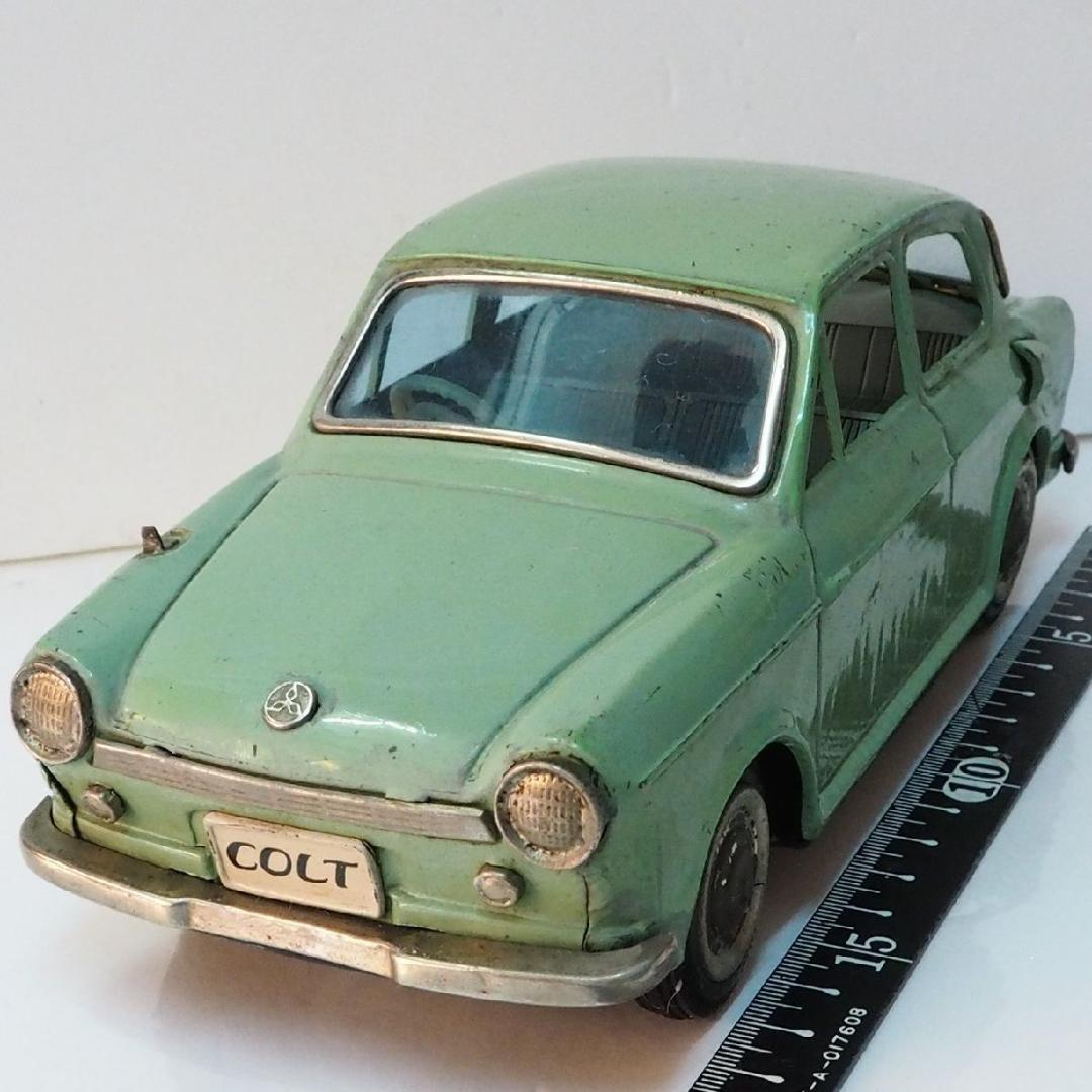 萬代屋【三菱コルト デラックス黄緑ミラー欠ホイル1個交換】フリクション ブリキ製