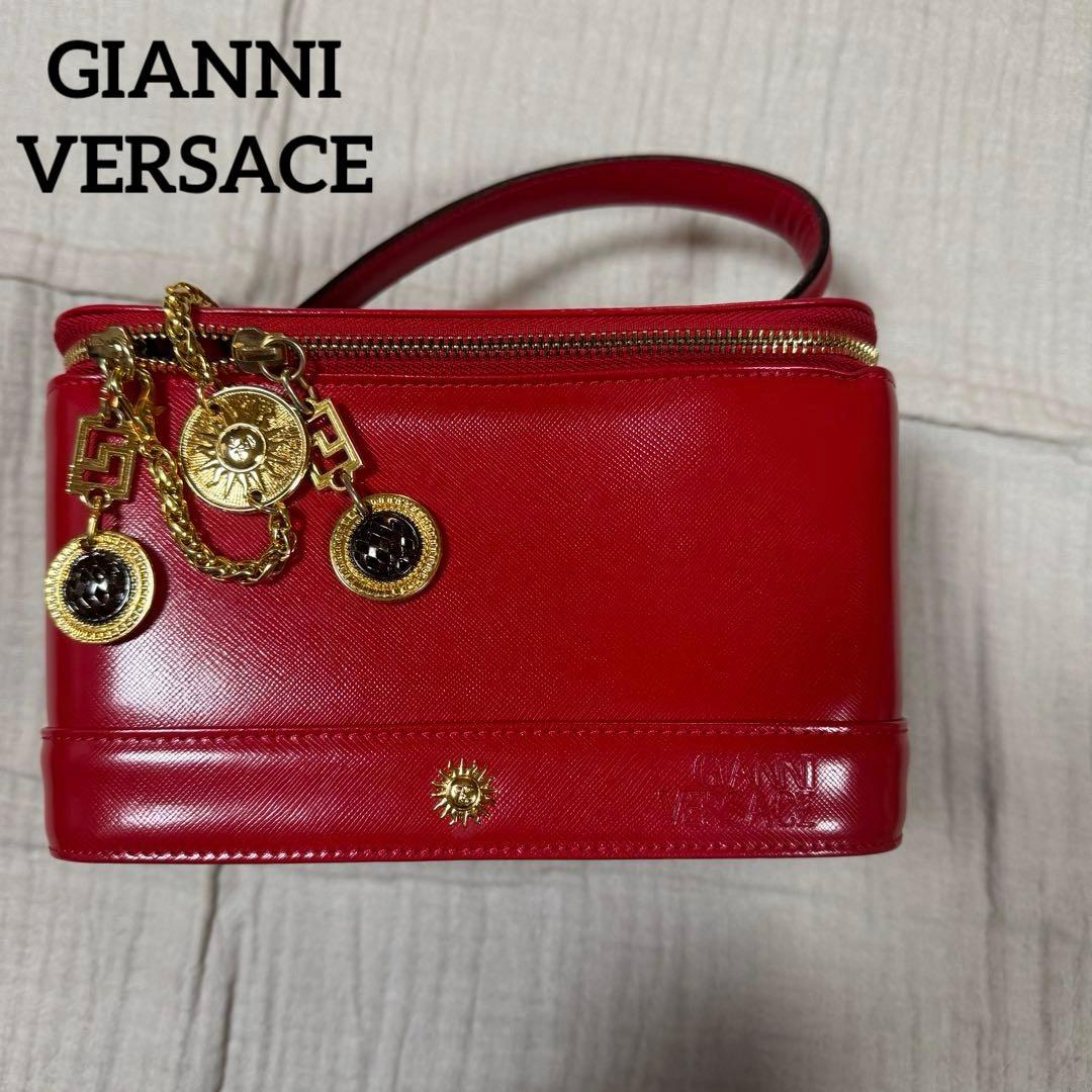 美品 VERSACE レザー バニティバッグ 赤　ファスナー チャーム 太陽