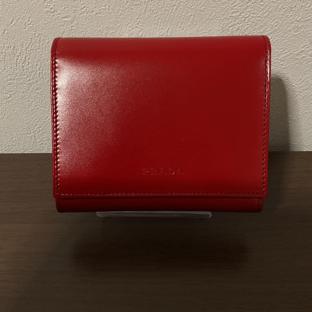 Mio 新品未使用 美品 プラダ レザー ロゴエンボス 折り財布