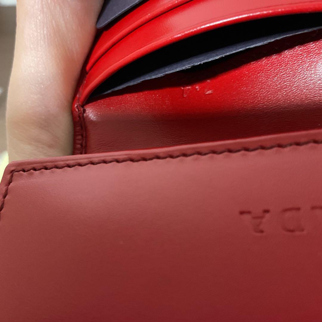 Mio 新品未使用 美品 プラダ レザー ロゴエンボス 折り財布