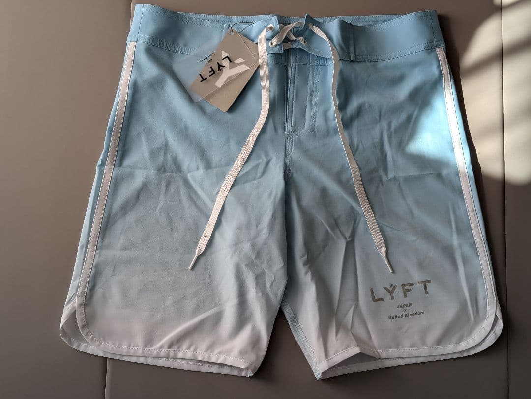 水着・ラッシュガード LYFT GRADATION STAGE SHORTS L.BLUE