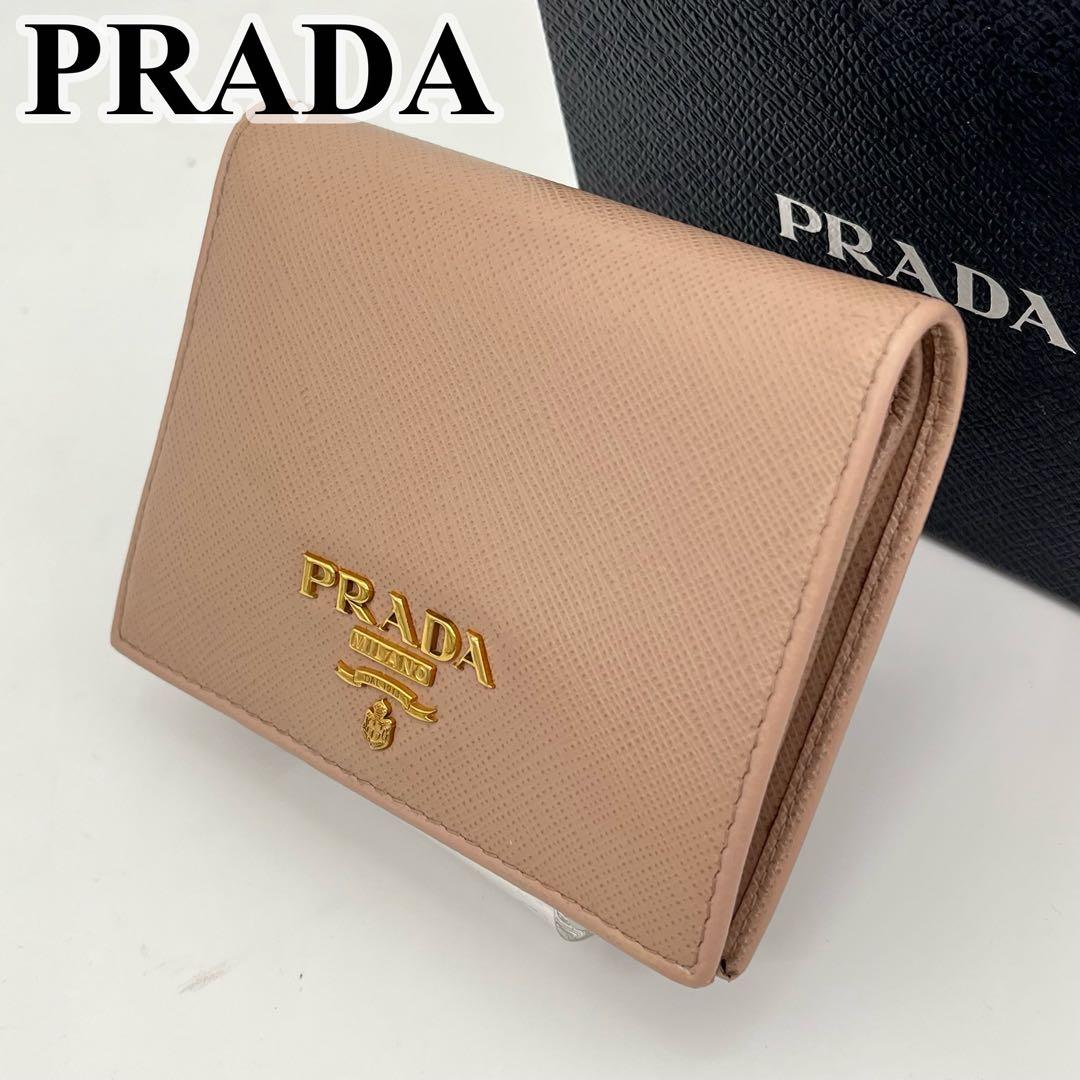 【美品】PRADA 二つ折り財布 ロゴ金具 サフィアーノレザー ピンク