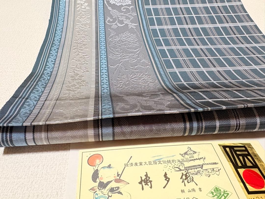 八寸名古屋帯 グレー系 花柄 チェック柄絹100パーセント博多織