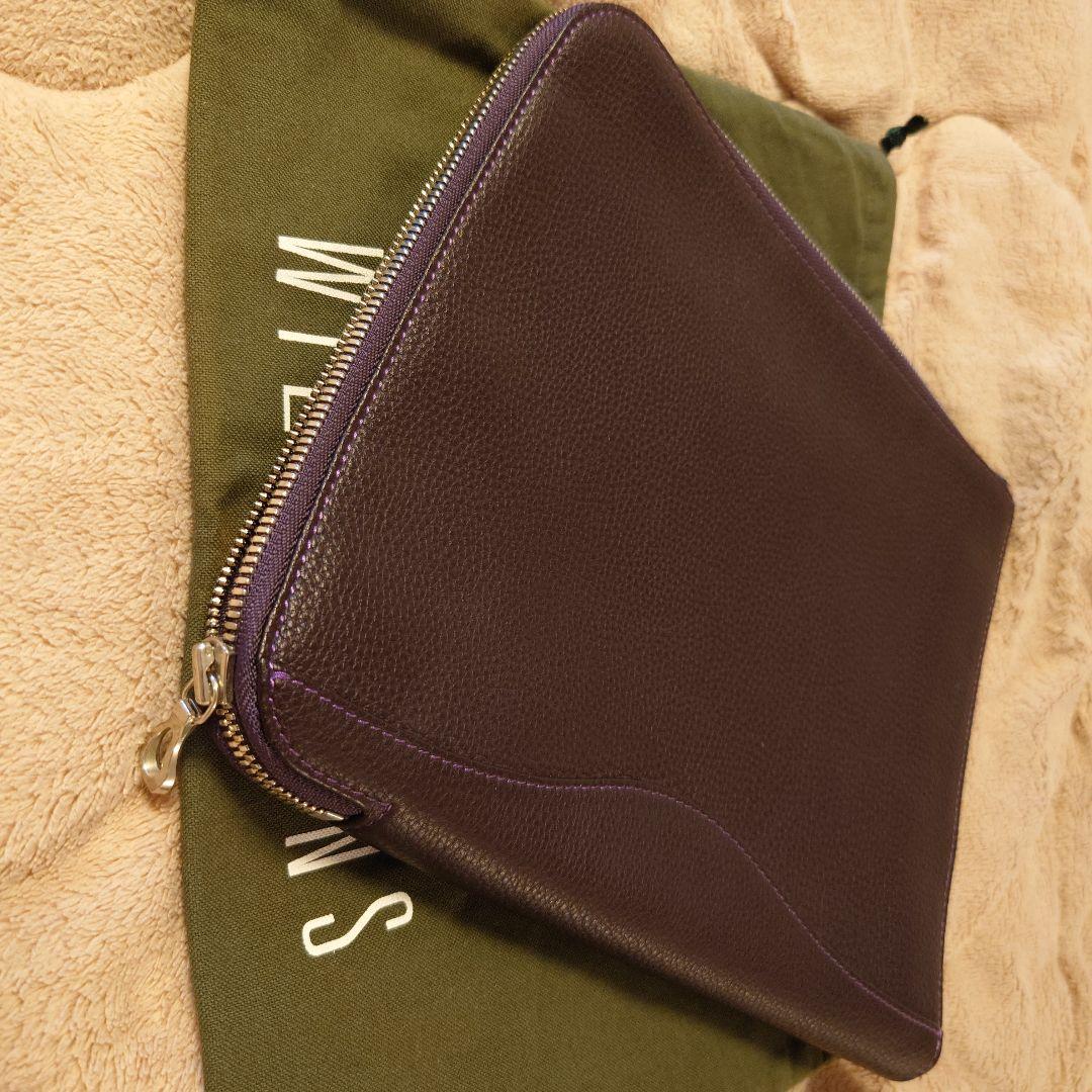 ワイルドスワンズ フォセット クラッチバッグ 王冠ロゴ パープル