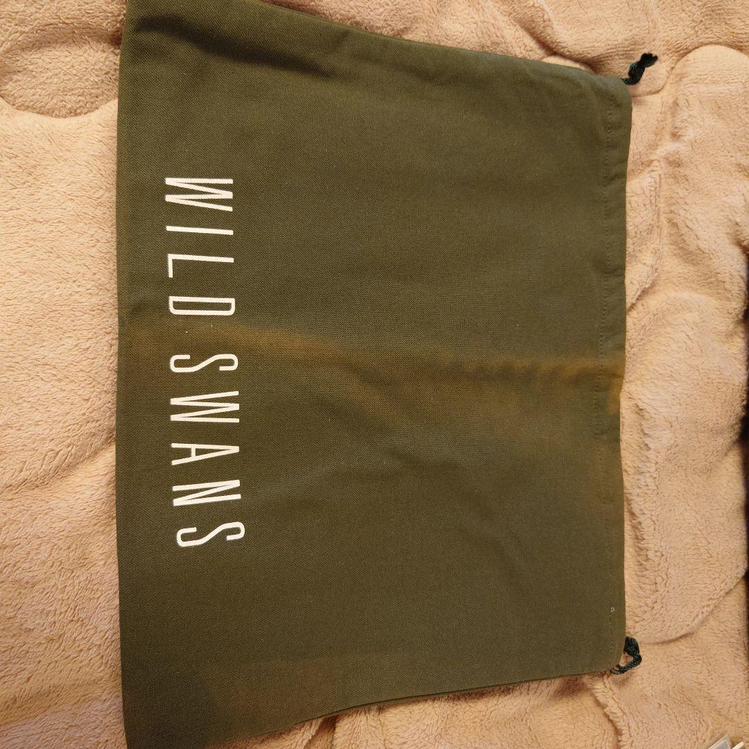 ワイルドスワンズ フォセット クラッチバッグ 王冠ロゴ パープル