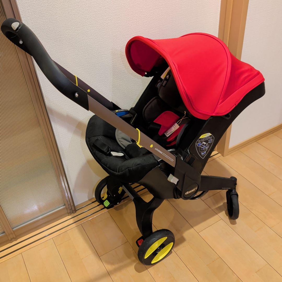 りゅーき美品doonaチャイルドシート フレームレッド　ホイールカバー付き