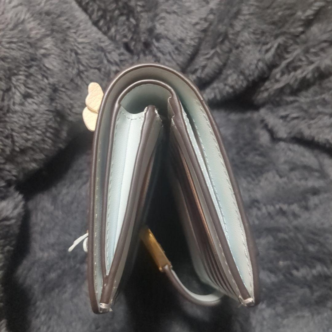 kate spadeフィービーフローラルアップリケターンロックウォレット