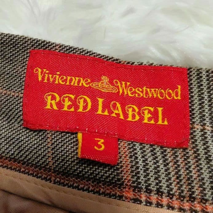 ヴィヴィアン　スカート　ウール　プリーツ チェック　オーヴボタン　裏地ロゴ　L