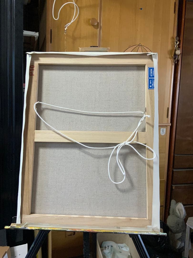 『まる子』　宇宙の目を持つ猫の油絵