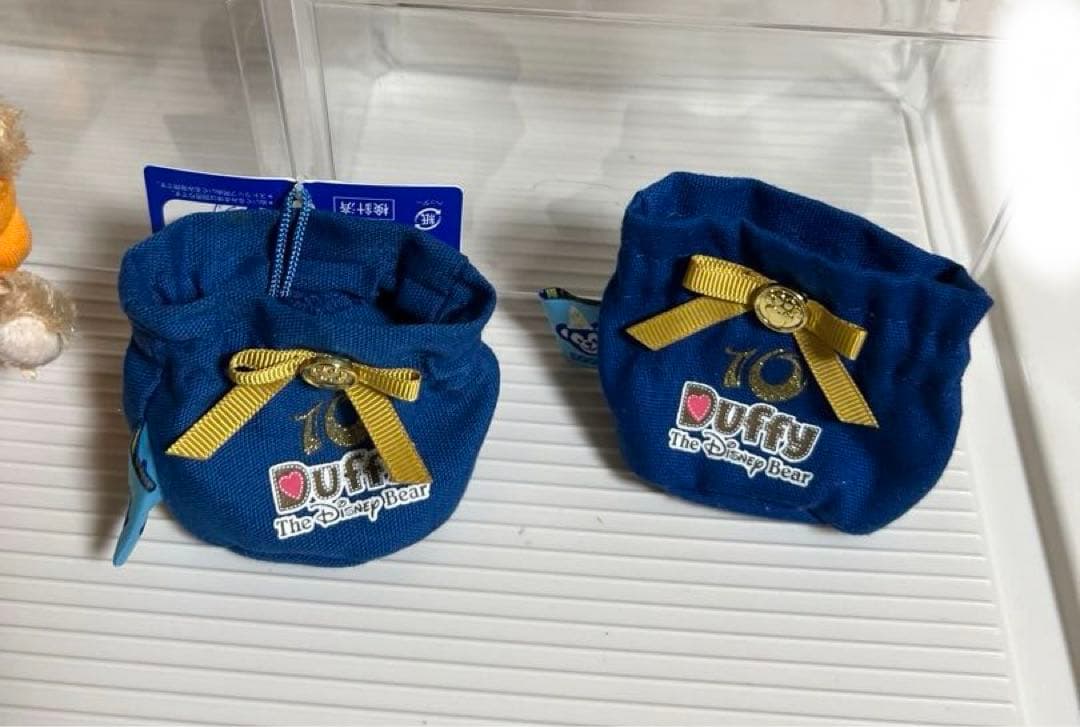 ディズニー、ダッフィー、シェリーメイぬいぐるみバッチ、10周年ストラップチェーン