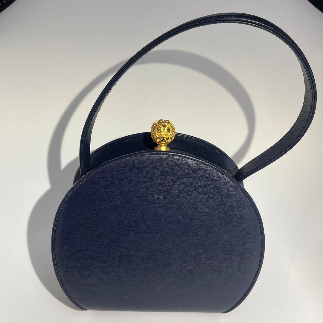 Mila schon ミラショーン 丸型 パーティーバッグ レザー 巾着