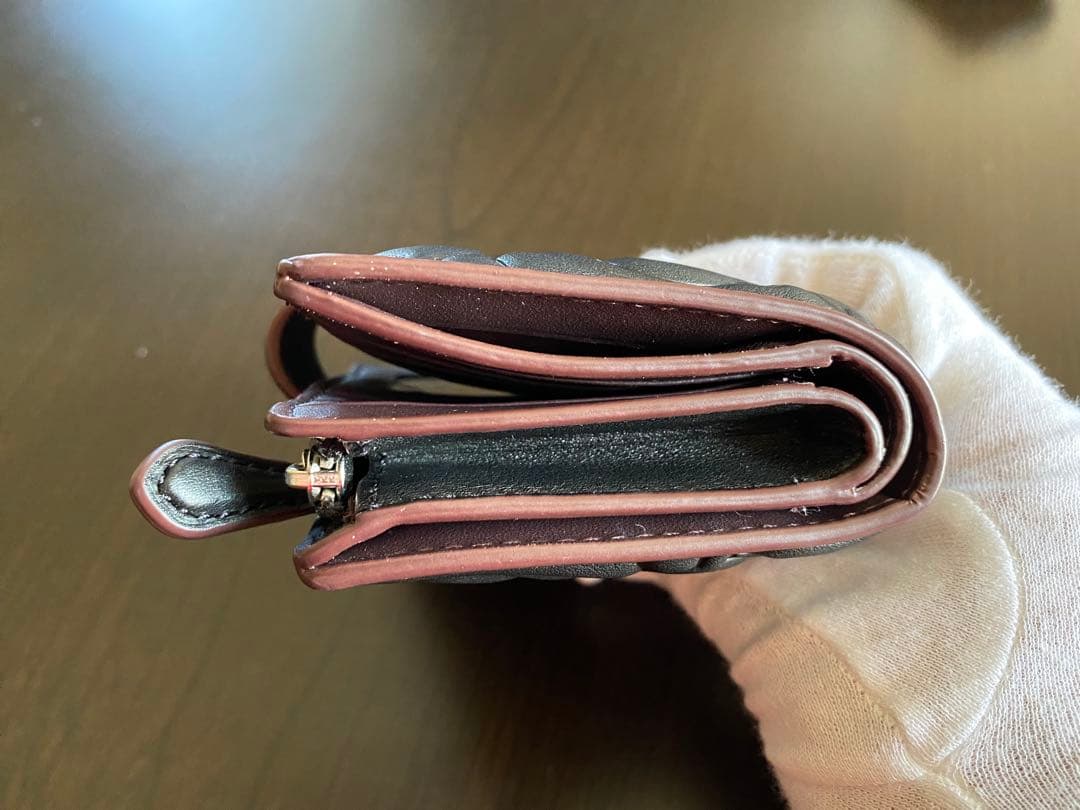 COACH エンボス加工 ブラック 二つ折り財布