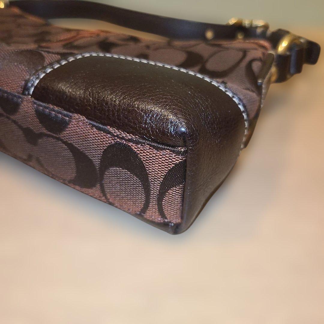 コーチ アクセサリーポーチ ワンショルダーバッグ シグネチャー ターンロック 茶