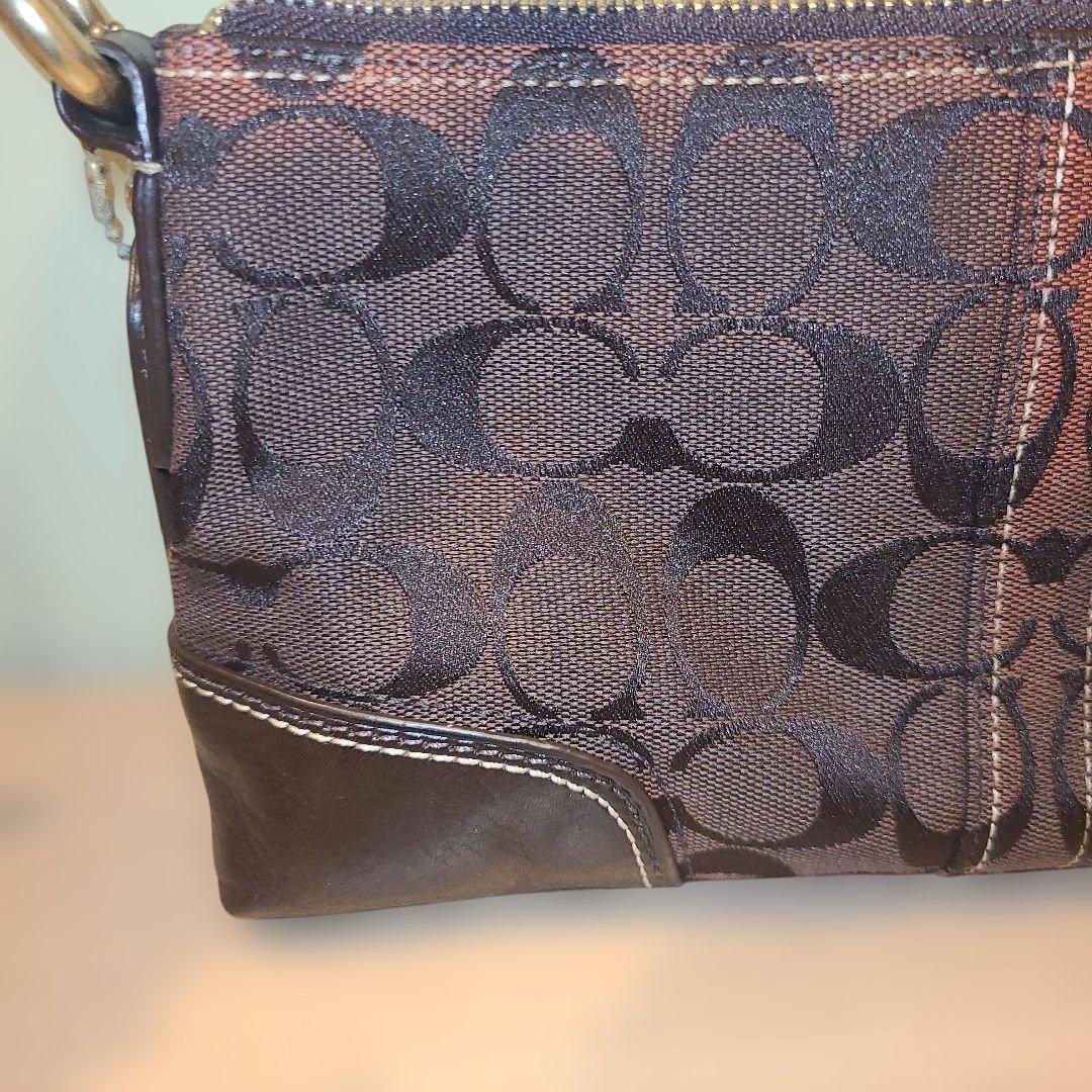 コーチ アクセサリーポーチ ワンショルダーバッグ シグネチャー ターンロック 茶